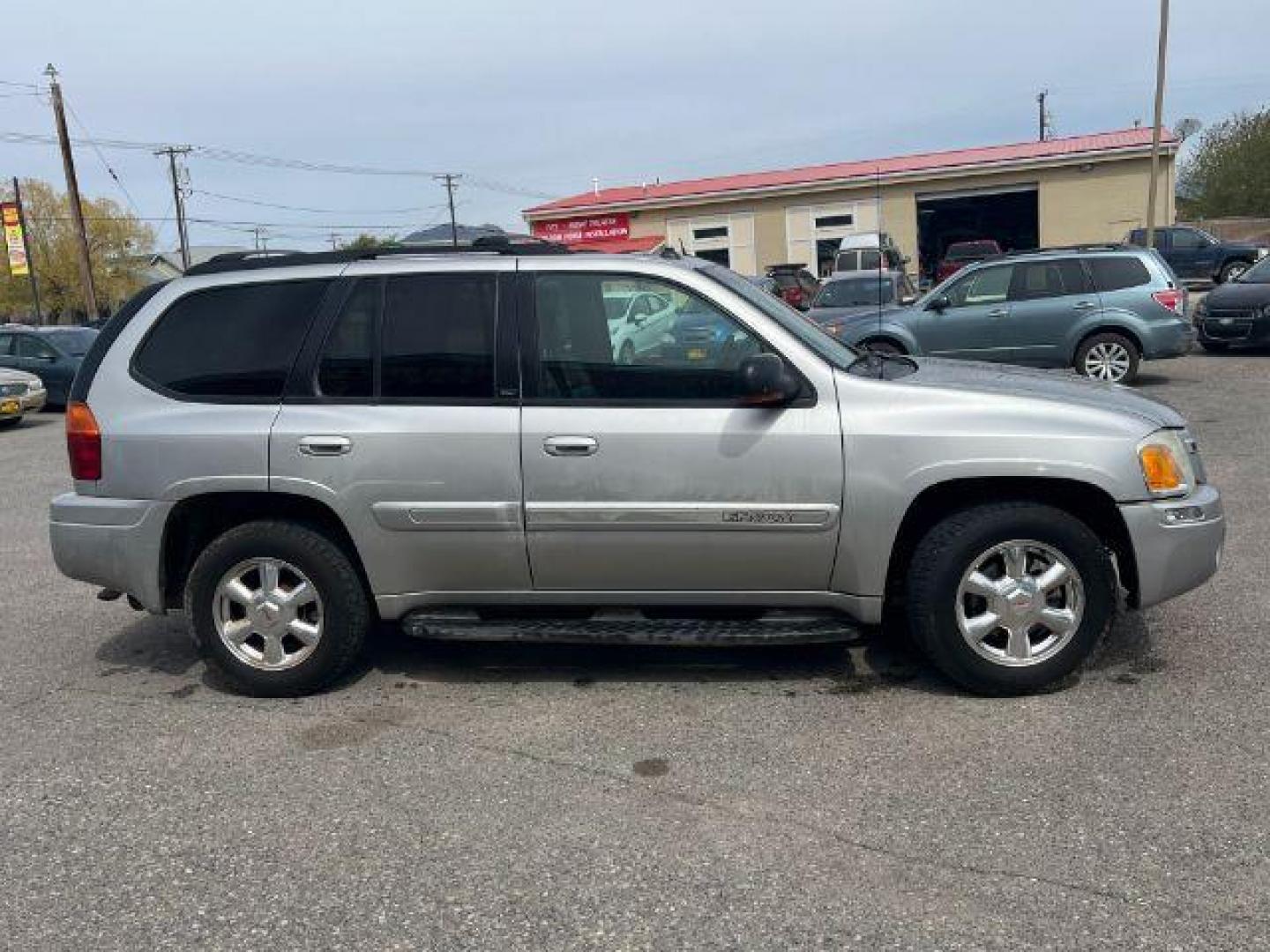 2004 GMC Envoy SLT 4WD (1GKDT13S042) with an 4.2L L6 DOHC 24V engine, 4-Speed Automatic transmission, located at 1821 N Montana Ave., Helena, MT, 59601, 0.000000, 0.000000 - Photo#3