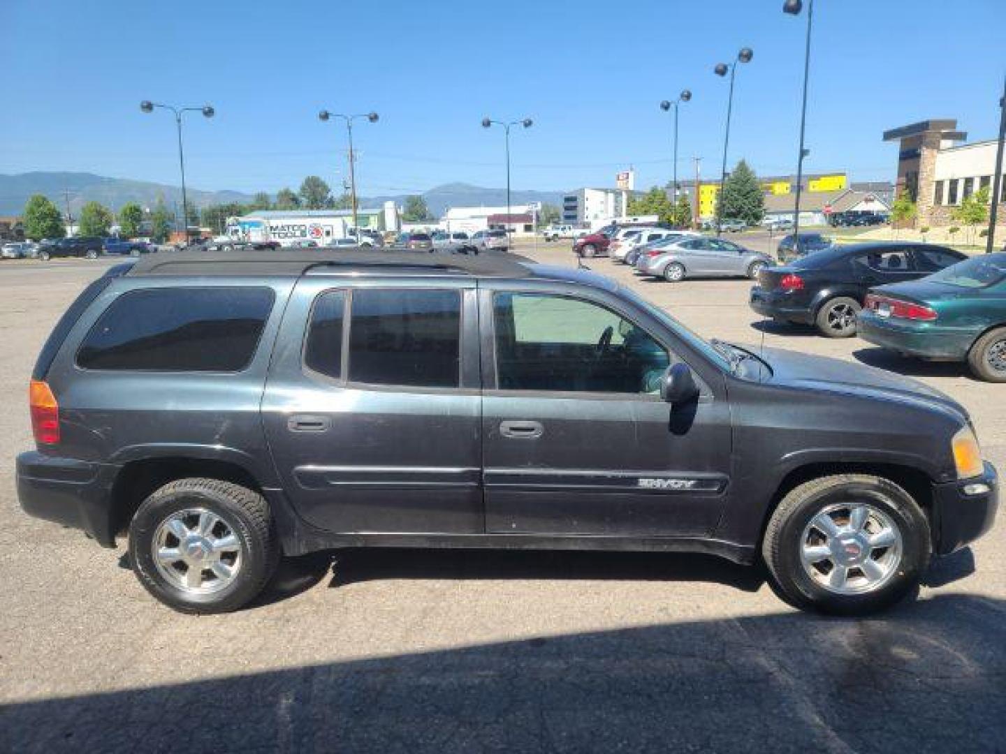 2004 GMC Envoy XL SLE 2WD (1GKES16S446) with an 4.2L L6 DOHC 24V engine, 4-Speed Automatic transmission, located at 1800 West Broadway, Missoula, 59808, (406) 543-1986, 46.881348, -114.023628 - Photo#2