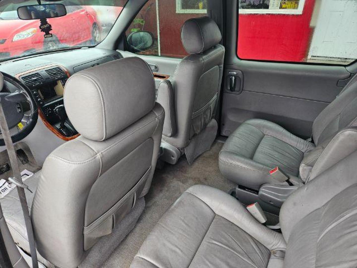 2004 Kia Sedona LX (KNDUP131046) with an 3.5L V6 DOHC 16V engine, 5-Speed Automatic transmission, located at 601 E. Idaho St., Kalispell, MT, 59901, 0.000000, 0.000000 - Photo#10