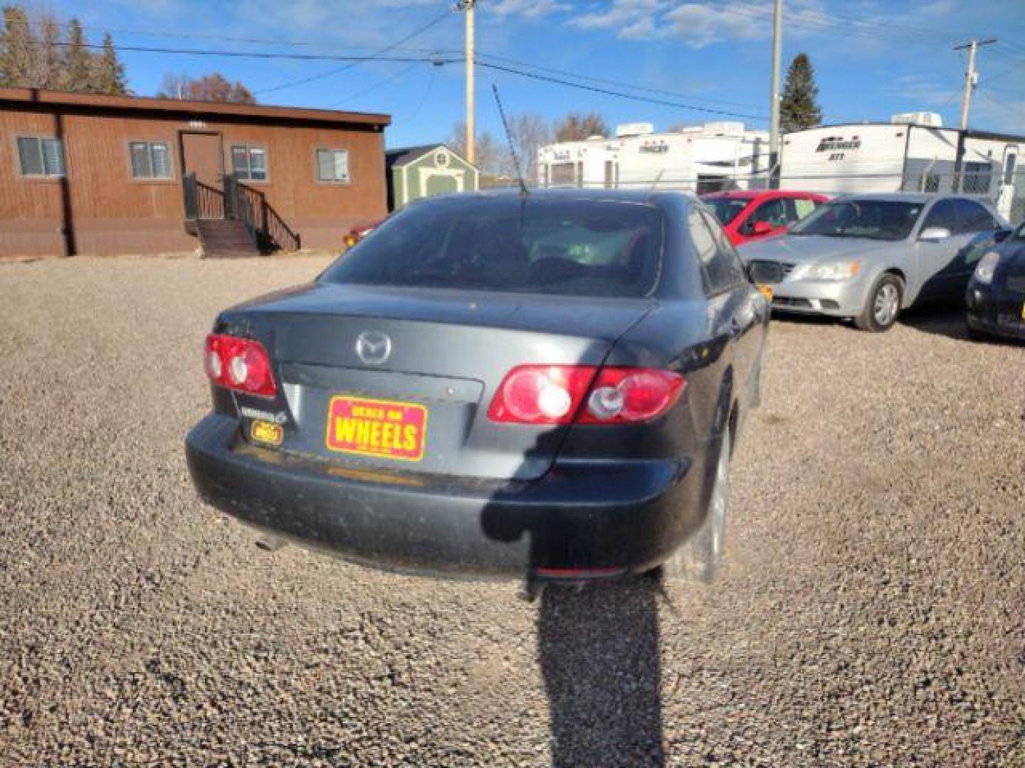 2004 Mazda Mazda6 s (1YVFP80D145) with an 3.0L V6 DOHC 24V engine, 5-Speed Manual transmission, located at 4801 10th Ave S,, Great Falls, MT, 59405, (406) 564-1505, 0.000000, 0.000000 - Photo#3