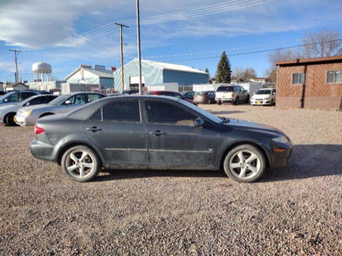 2004 Mazda Mazda6 s (1YVFP80D145) with an 3.0L V6 DOHC 24V engine, 5-Speed Manual transmission, located at 4801 10th Ave S,, Great Falls, MT, 59405, (406) 564-1505, 0.000000, 0.000000 - Photo#4