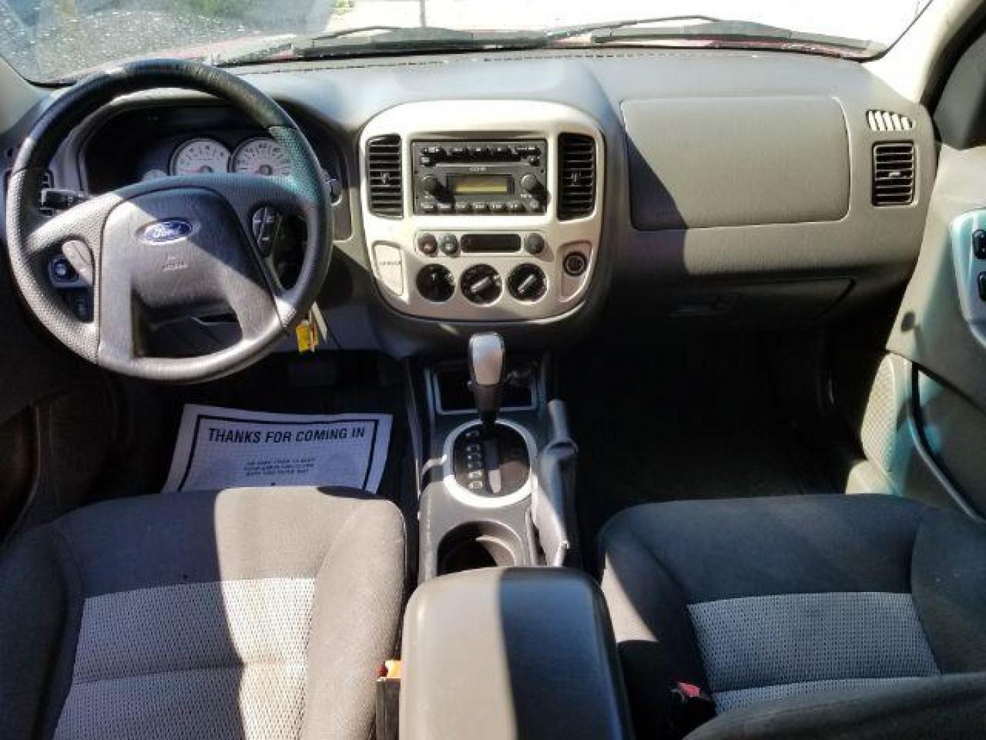 2005 Red Fire Metallic Ford Escape XLT 4WD (1FMYU93125K) with an 3.0L V6 DOHC 24V engine, 4-Speed Automatic transmission, located at 4801 10th Ave S,, Great Falls, MT, 59405, (406) 564-1505, 0.000000, 0.000000 - Photo#11