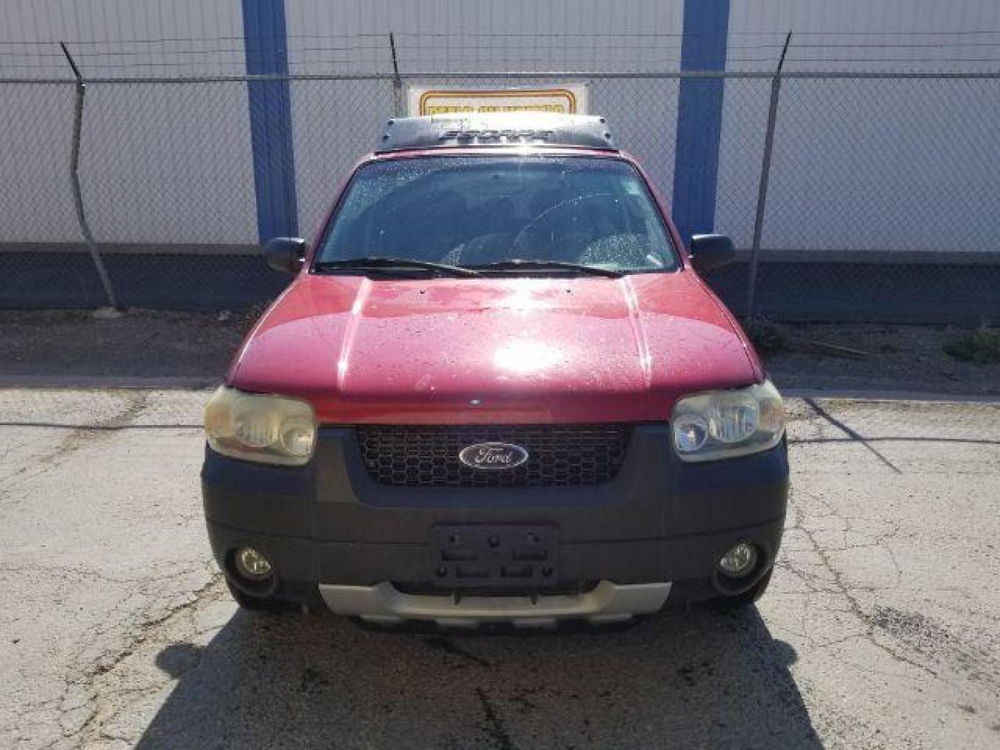 2005 Red Fire Metallic Ford Escape XLT 4WD (1FMYU93125K) with an 3.0L V6 DOHC 24V engine, 4-Speed Automatic transmission, located at 4801 10th Ave S,, Great Falls, MT, 59405, (406) 564-1505, 0.000000, 0.000000 - Photo#1