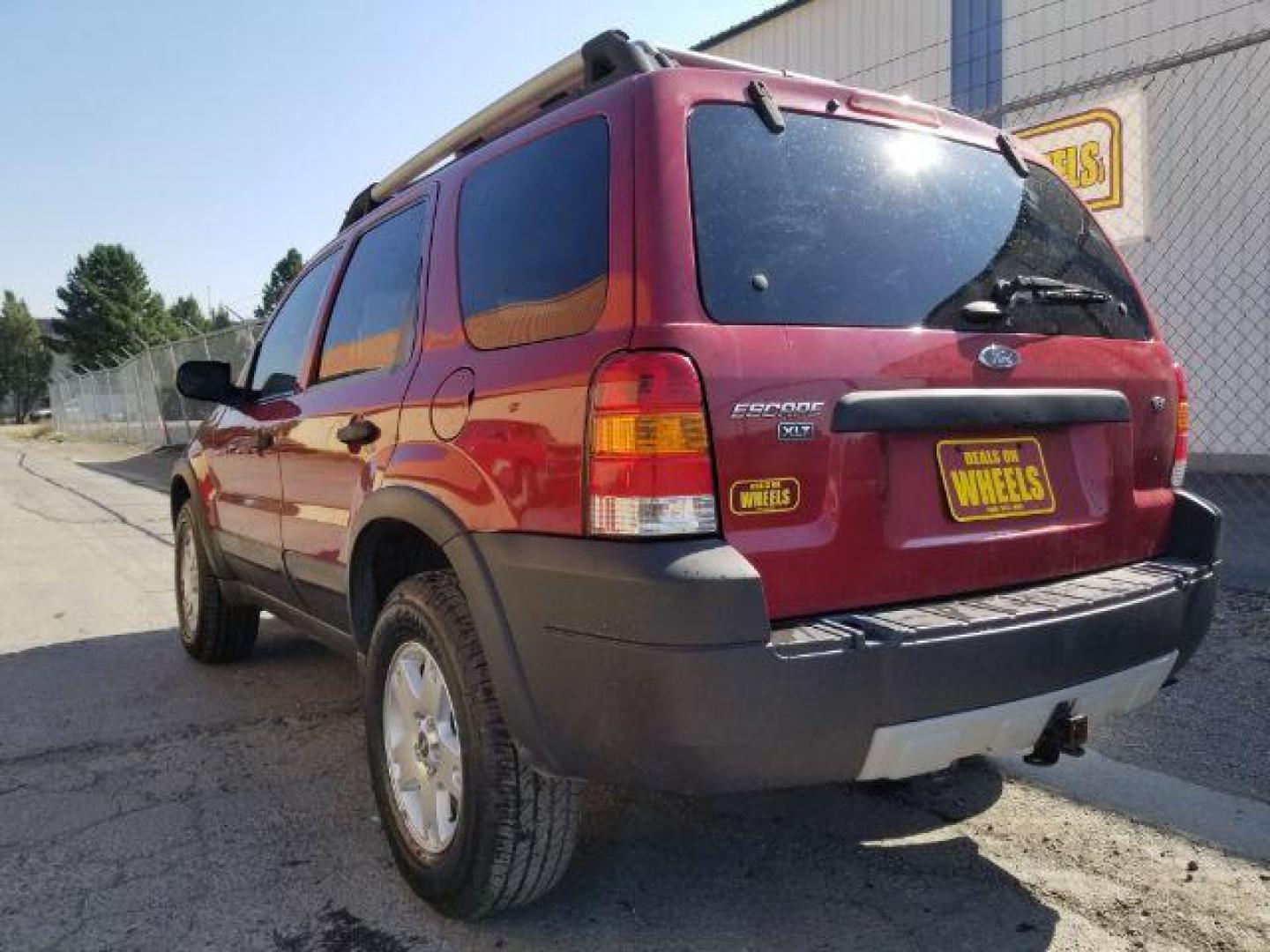 2005 Red Fire Metallic Ford Escape XLT 4WD (1FMYU93125K) with an 3.0L V6 DOHC 24V engine, 4-Speed Automatic transmission, located at 4801 10th Ave S,, Great Falls, MT, 59405, (406) 564-1505, 0.000000, 0.000000 - Photo#3