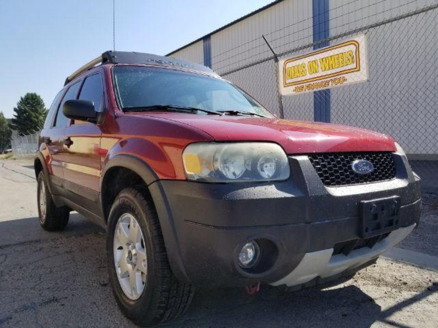 2005 Red Fire Metallic Ford Escape XLT 4WD (1FMYU93125K) with an 3.0L V6 DOHC 24V engine, 4-Speed Automatic transmission, located at 4801 10th Ave S,, Great Falls, MT, 59405, (406) 564-1505, 0.000000, 0.000000 - Photo#6