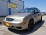 2005 Arizona Beige Metall Ford Focus ZX4 SE (1FAFP34N75W) with an 2.0L L4 DOHC 16V engine, located at 601 E. Idaho St., Kalispell, MT, 59901, 0.000000, 0.000000 - Photo#0