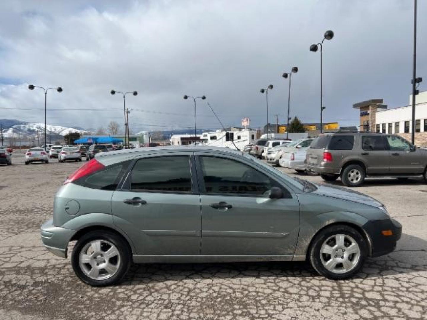 2005 Ford Focus ZX5 SES (3FAHP37N85R) with an 2.0L L4 DOHC 16V engine, located at 4047 Montana Ave., Billings, MT, 59101, 45.770847, -108.529800 - Photo#2