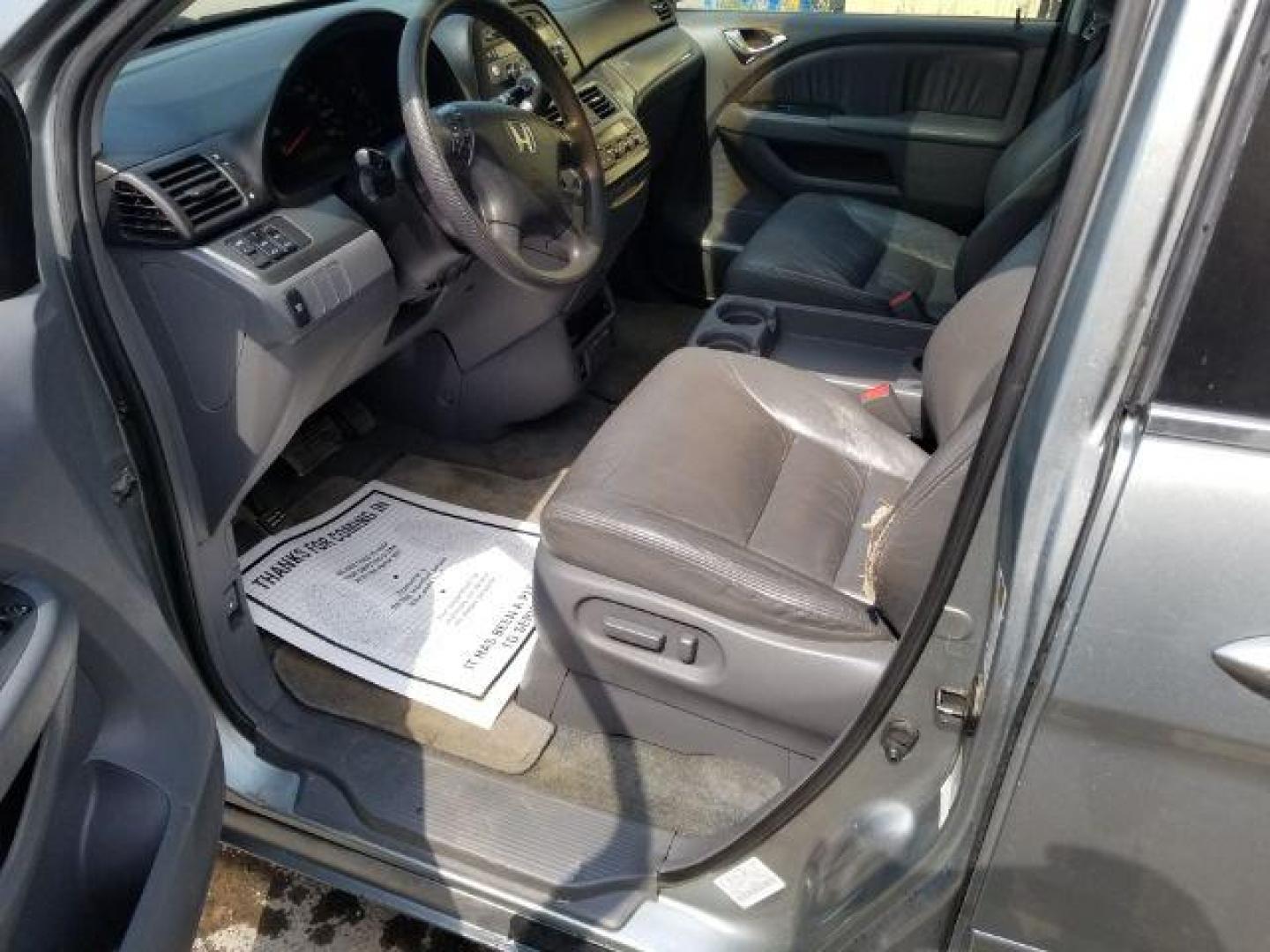 2005 Honda Odyssey EX w/ Leather DVD (5FNRL38735B) with an 3.5L V6 SOHC 24V engine, 5-Speed Automatic transmission, located at 601 E. Idaho St., Kalispell, MT, 59901, 0.000000, 0.000000 - Photo#7