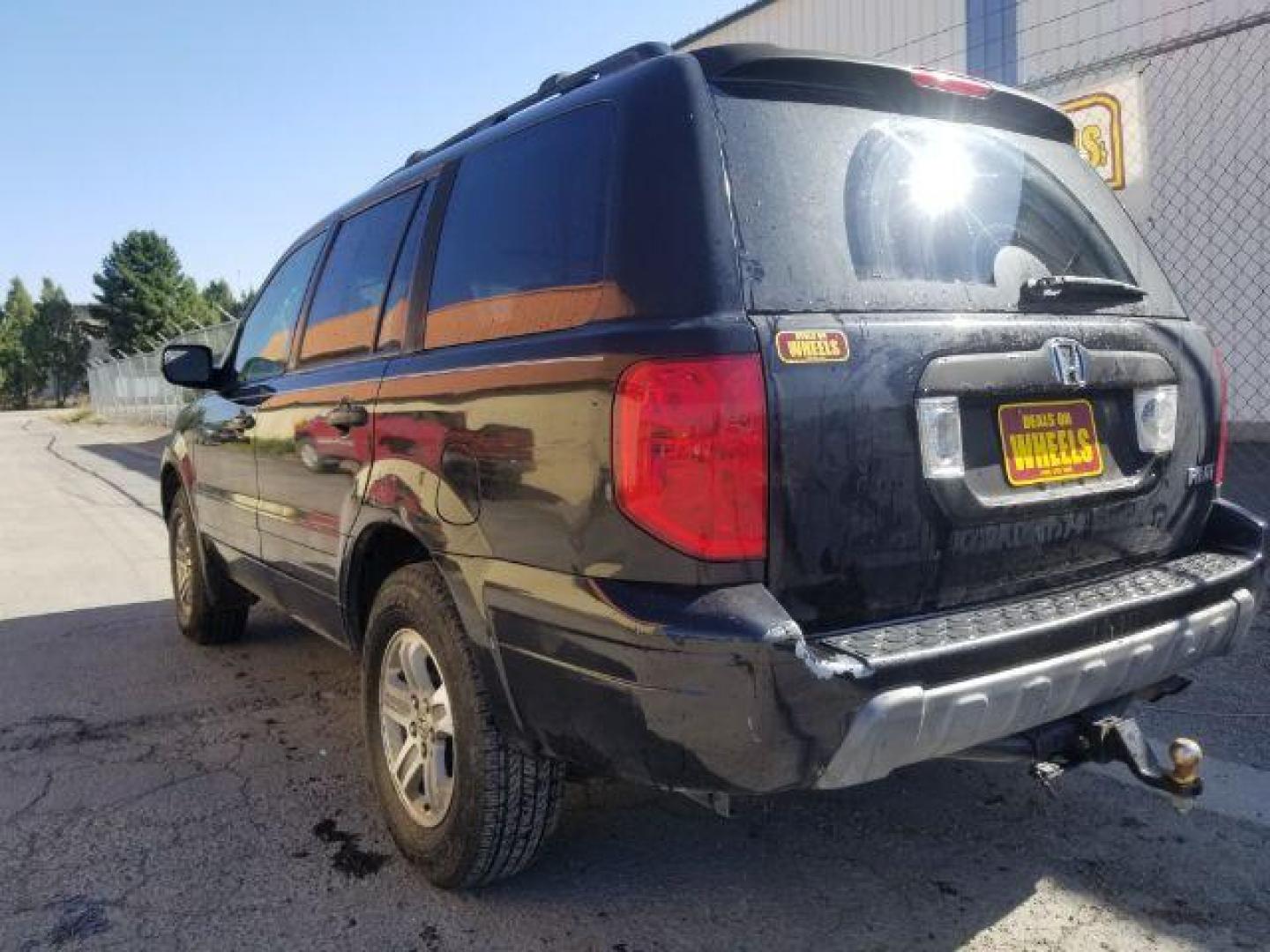 2005 Nighthawk Black Pearl Honda Pilot EX (2HKYF18425H) with an 3.5L V6 SOHC 24V engine, 5-Speed Automatic transmission, located at 1800 West Broadway, Missoula, 59808, (406) 543-1986, 46.881348, -114.023628 - Photo#3