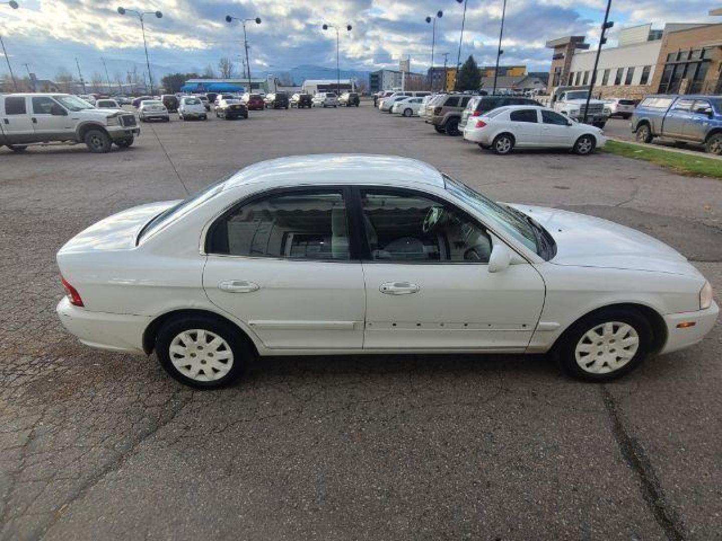 2005 Kia Optima LX (KNAGD126955) with an 2.4L L4 DOHC 16V engine, located at 1800 West Broadway, Missoula, 59808, (406) 543-1986, 46.881348, -114.023628 - Photo#2