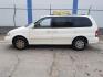 2005 Clear White /Beige Cloth Interior Kia Sedona LX (KNDUP132856) with an 3.5L V6 DOHC 16V engine, 5-Speed Automatic transmission, located at 4801 10th Ave S,, Great Falls, MT, 59405, (406) 564-1505, 0.000000, 0.000000 - Photo#2