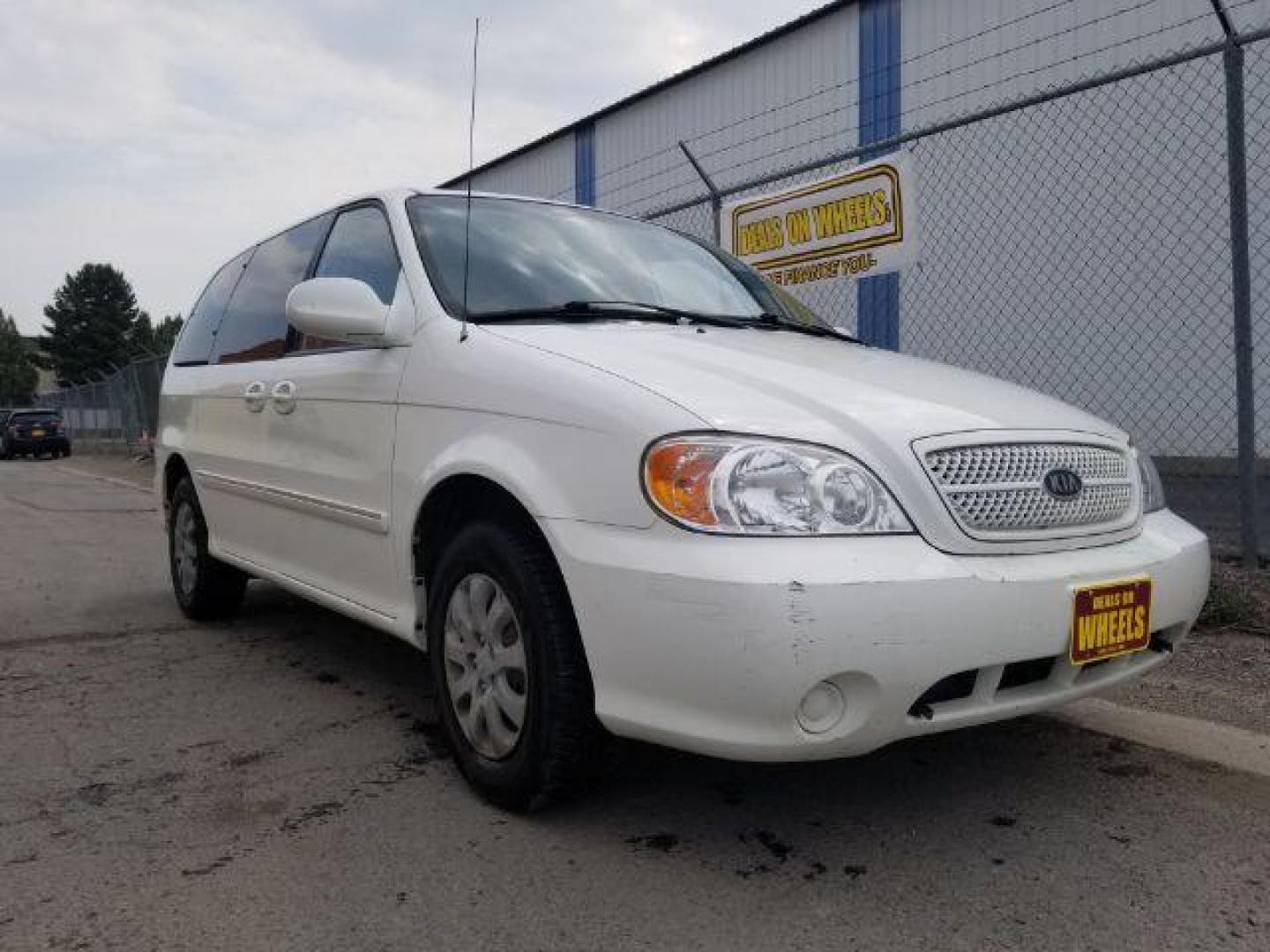 2005 Clear White /Beige Cloth Interior Kia Sedona LX (KNDUP132856) with an 3.5L V6 DOHC 16V engine, 5-Speed Automatic transmission, located at 4801 10th Ave S,, Great Falls, MT, 59405, (406) 564-1505, 0.000000, 0.000000 - Photo#6