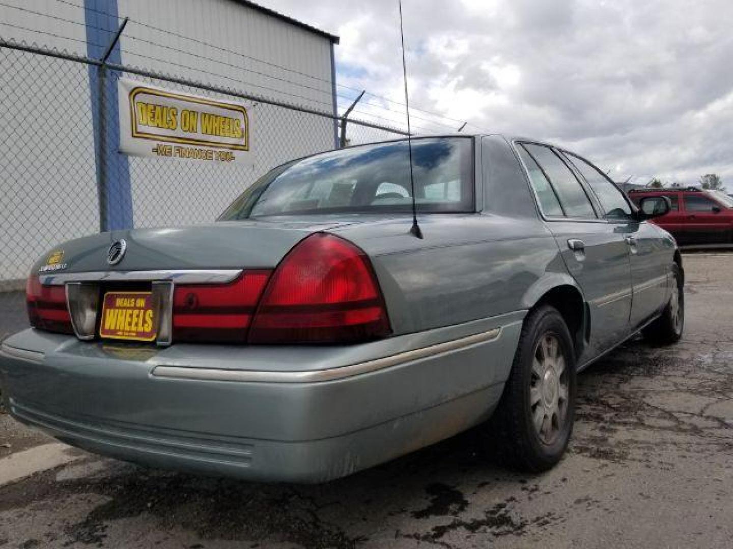 2005 Light Ice Blue Metallic Mercury Grand Marquis LS Ultimate (2MEHM75W25X) with an 4.6L V8 OHC 16V engine, 4-Speed Automatic transmission, located at 1800 West Broadway, Missoula, 59808, (406) 543-1986, 46.881348, -114.023628 - Photo#4