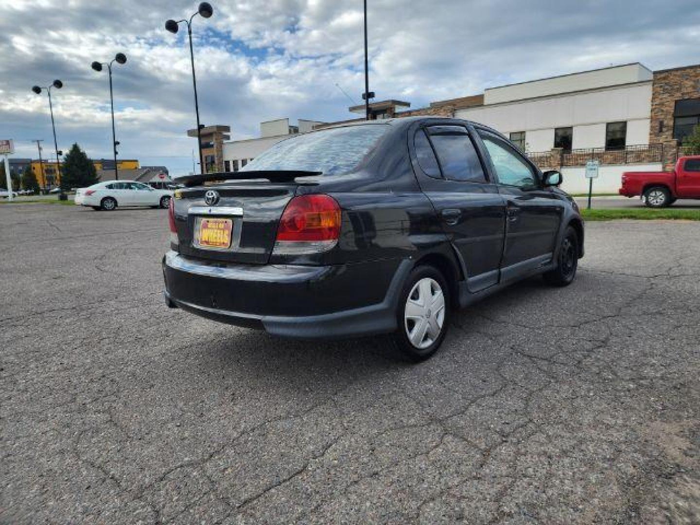 2005 Black Sand Pearl Toyota Echo 4-Door Sedan (JTDBT123050) with an 1.5L L4 DOHC 16V engine, located at 1800 West Broadway, Missoula, 59808, (406) 543-1986, 46.881348, -114.023628 - Photo#4