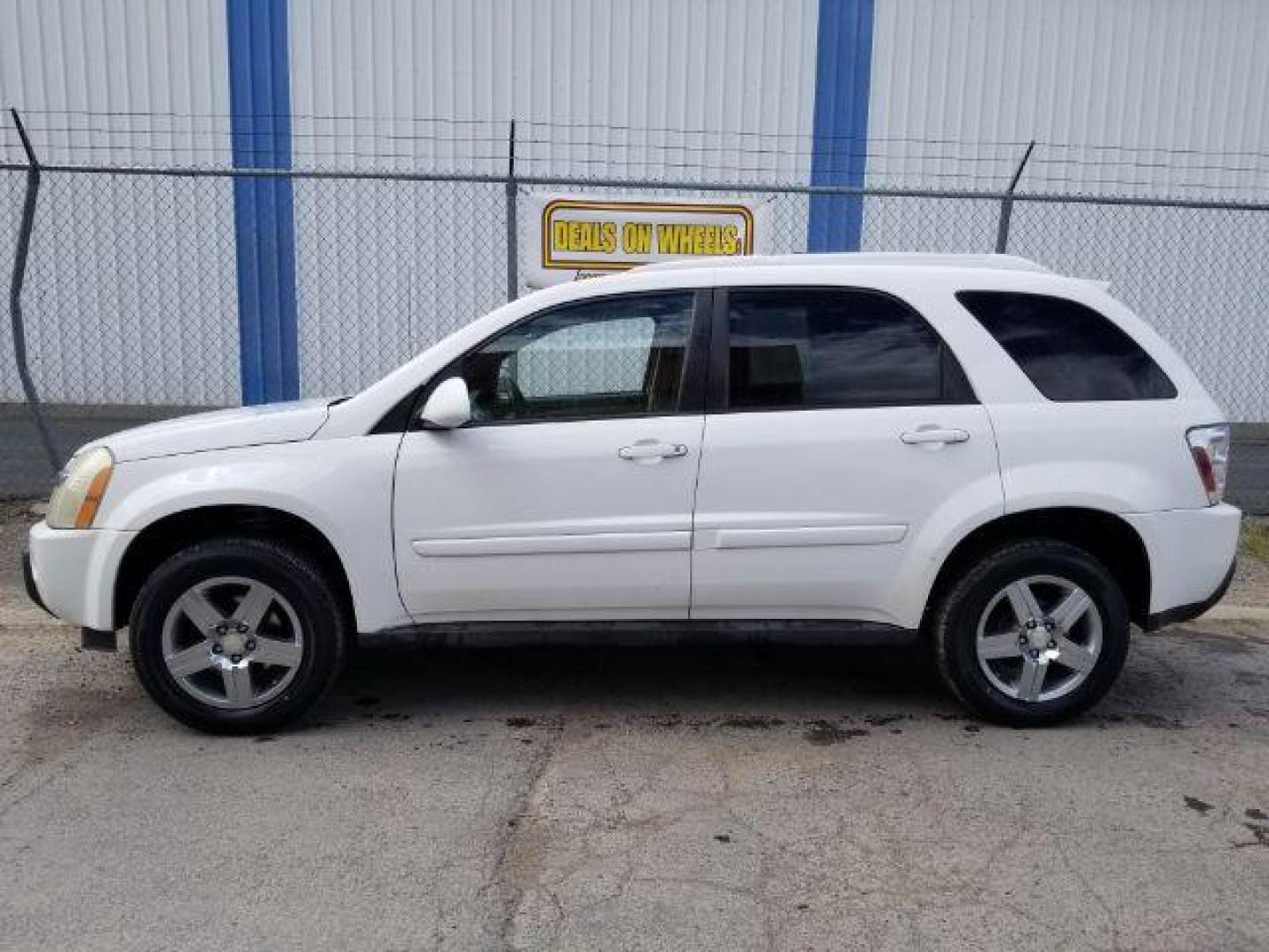 2006 Chevrolet Equinox LT AWD (2CNDL73F166) with an 3.4L V6 OHV 12V engine, 5-Speed Automatic transmission, located at 4047 Montana Ave., Billings, MT, 59101, 45.770847, -108.529800 - Photo#2