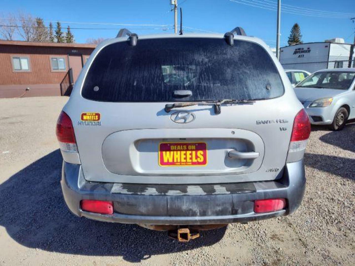 2006 Hyundai Santa Fe GLS 2.7L 4WD (KM8SC73D36U) with an 2.7L V6 DOHC 24V engine, 4-Speed Automatic transmission, located at 4801 10th Ave S,, Great Falls, MT, 59405, (406) 564-1505, 0.000000, 0.000000 - Photo#3