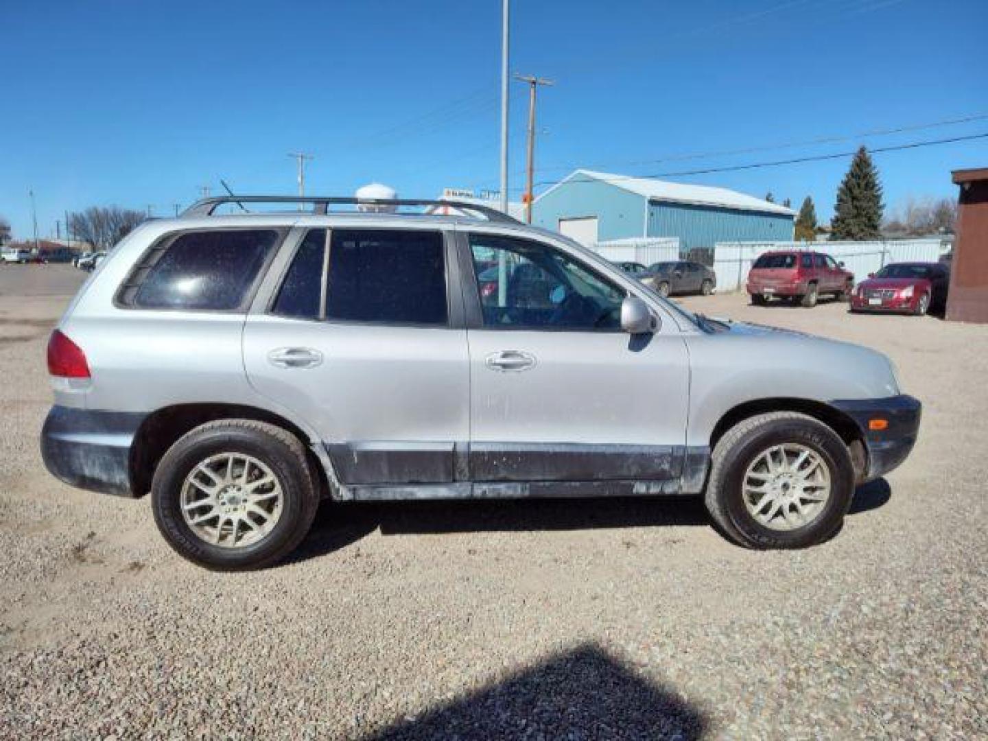 2006 Hyundai Santa Fe GLS 2.7L 4WD (KM8SC73D36U) with an 2.7L V6 DOHC 24V engine, 4-Speed Automatic transmission, located at 4801 10th Ave S,, Great Falls, MT, 59405, (406) 564-1505, 0.000000, 0.000000 - Photo#5