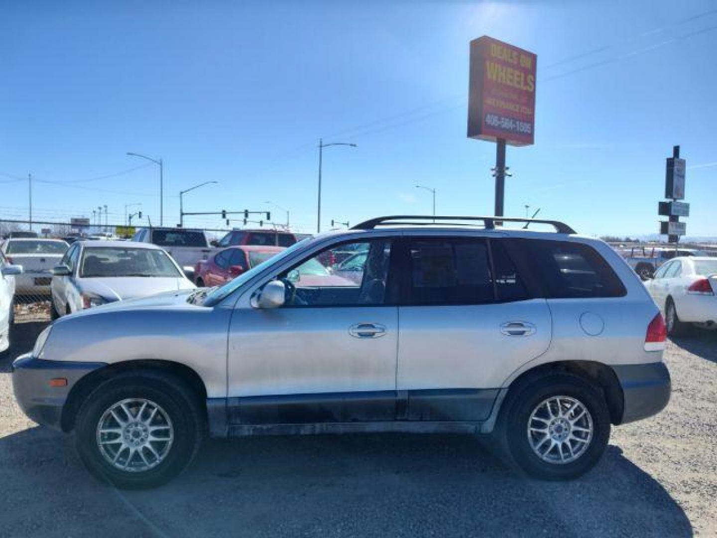 2006 Hyundai Santa Fe GLS 2.7L 4WD (KM8SC73D36U) with an 2.7L V6 DOHC 24V engine, 4-Speed Automatic transmission, located at 4801 10th Ave S,, Great Falls, MT, 59405, (406) 564-1505, 0.000000, 0.000000 - Photo#1