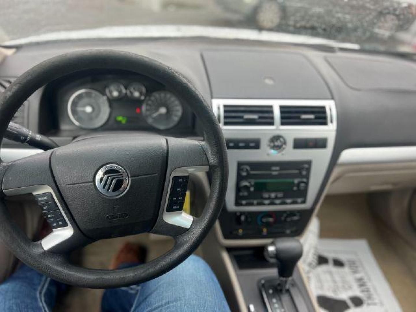 2006 Mercury Milan V6 Premier (3MEFM08106R) with an 3.0L V6 DOHC 24V engine, 6-Speed Automatic transmission, located at 4047 Montana Ave., Billings, MT, 59101, 45.770847, -108.529800 - Photo#9