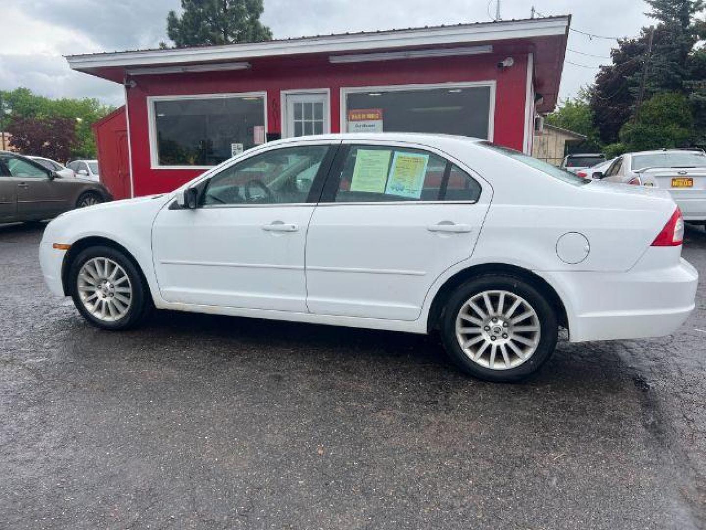 2006 Mercury Milan V6 Premier (3MEFM08106R) with an 3.0L V6 DOHC 24V engine, 6-Speed Automatic transmission, located at 4047 Montana Ave., Billings, MT, 59101, 45.770847, -108.529800 - Photo#1