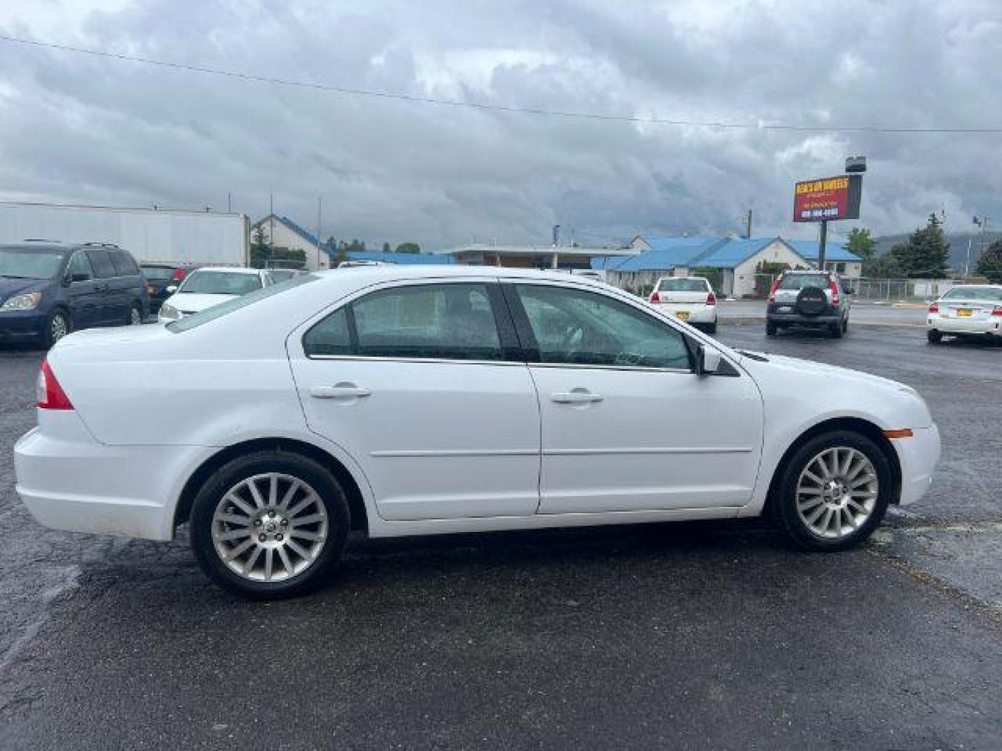 2006 Mercury Milan V6 Premier (3MEFM08106R) with an 3.0L V6 DOHC 24V engine, 6-Speed Automatic transmission, located at 4047 Montana Ave., Billings, MT, 59101, 45.770847, -108.529800 - Photo#5