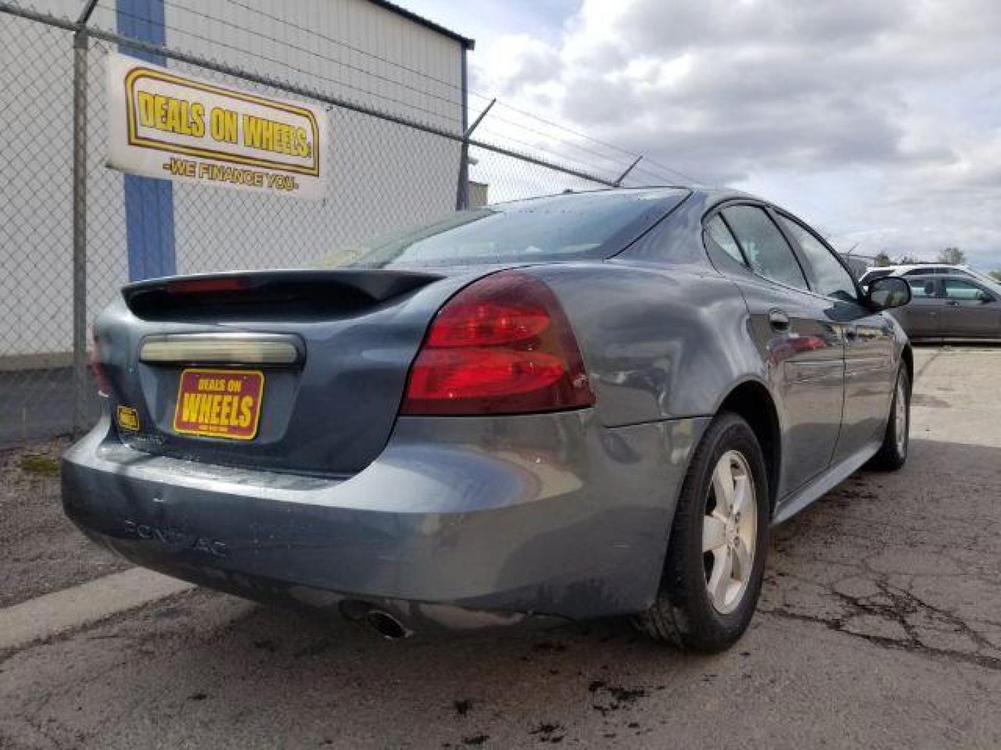 2006 Blue-Green Crystal Pontiac Grand Prix Base (2G2WP552961) with an 3.8L V6 OHV 12V engine, 4-Speed Automatic transmission, located at 1800 West Broadway, Missoula, 59808, (406) 543-1986, 46.881348, -114.023628 - Photo#4