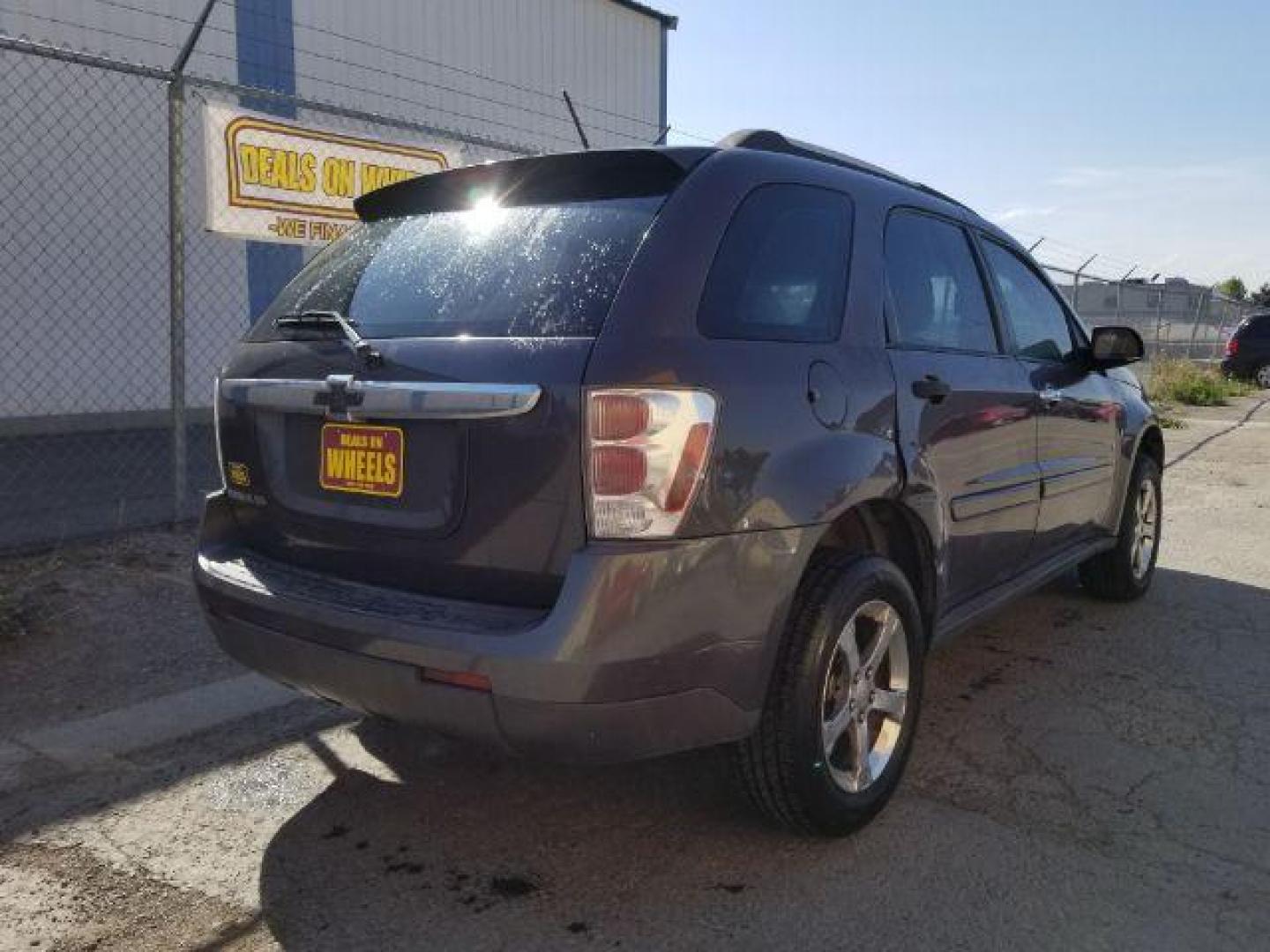 2007 Granite Gray Metalli Chevrolet Equinox LS 2WD (2CNDL13F976) with an 3.4L V6 OHV 12V engine, 5-Speed Automatic transmission, located at 4801 10th Ave S,, Great Falls, MT, 59405, (406) 564-1505, 0.000000, 0.000000 - Photo#4