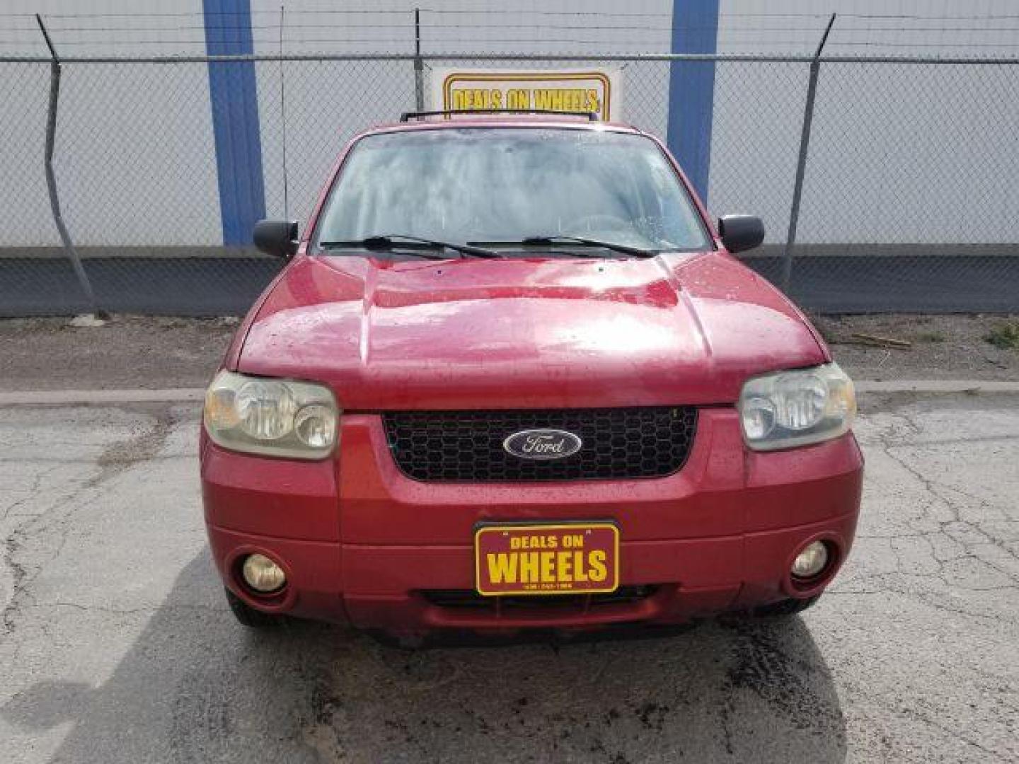 2007 Red Fire Metallic Ford Escape Limited 4WD (1FMYU94127K) with an 3.0L V6 DOHC 24V engine, 4-Speed Automatic transmission, located at 4801 10th Ave S,, Great Falls, MT, 59405, (406) 564-1505, 0.000000, 0.000000 - Photo#1