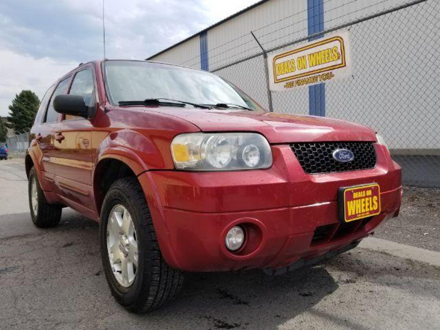 2007 Red Fire Metallic Ford Escape Limited 4WD (1FMYU94127K) with an 3.0L V6 DOHC 24V engine, 4-Speed Automatic transmission, located at 4801 10th Ave S,, Great Falls, MT, 59405, (406) 564-1505, 0.000000, 0.000000 - Photo#6