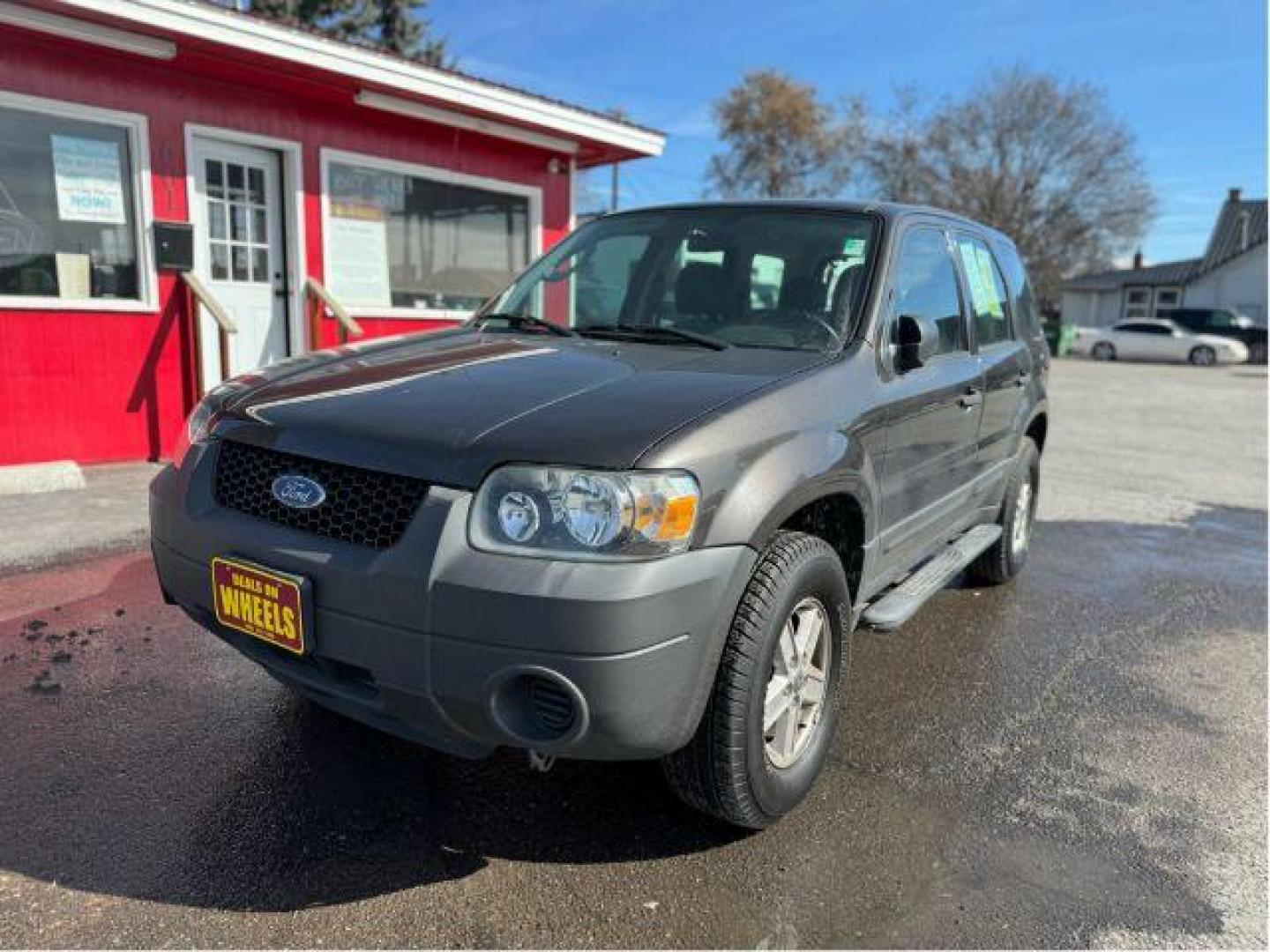 2007 Tungsten Grey Metallic Ford Escape XLS 4WD (1FMCU92Z87K) with an 2.3L L4 DOHC 16V engine, 4-Speed Automatic transmission, located at 601 E. Idaho St., Kalispell, MT, 59901, 0.000000, 0.000000 - Photo#0