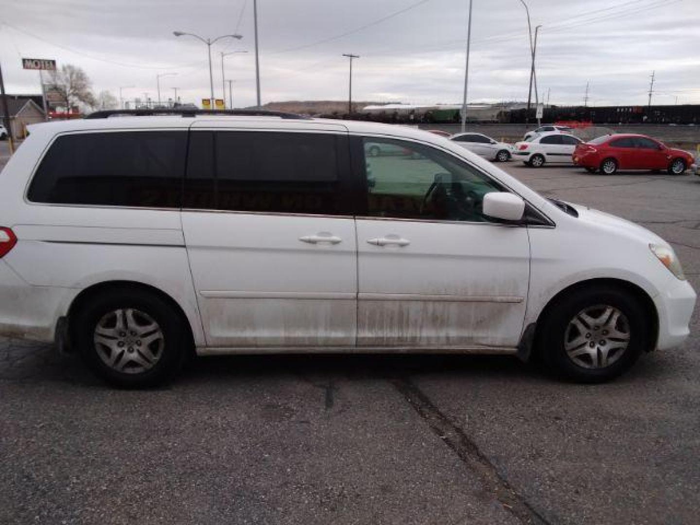 2007 Honda Odyssey EX (5FNRL38407B) with an 3.5L V6 SOHC 24V engine, 5-Speed Automatic transmission, located at 4047 Montana Ave., Billings, MT, 59101, 45.770847, -108.529800 - Photo#3