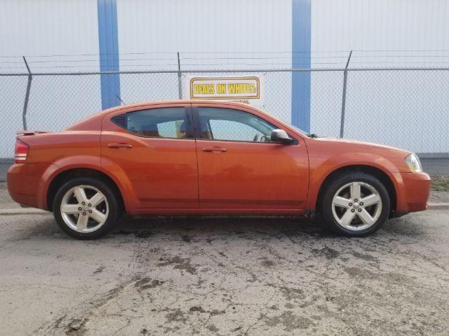 2008 Sunburst Orange Pear Dodge Avenger SXT (1B3LC56R08N) with an 2.7L V6 DOHC 24V FFV engine, 4-Speed Automatic transmission, located at 1800 West Broadway, Missoula, 59808, (406) 543-1986, 46.881348, -114.023628 - Photo#3