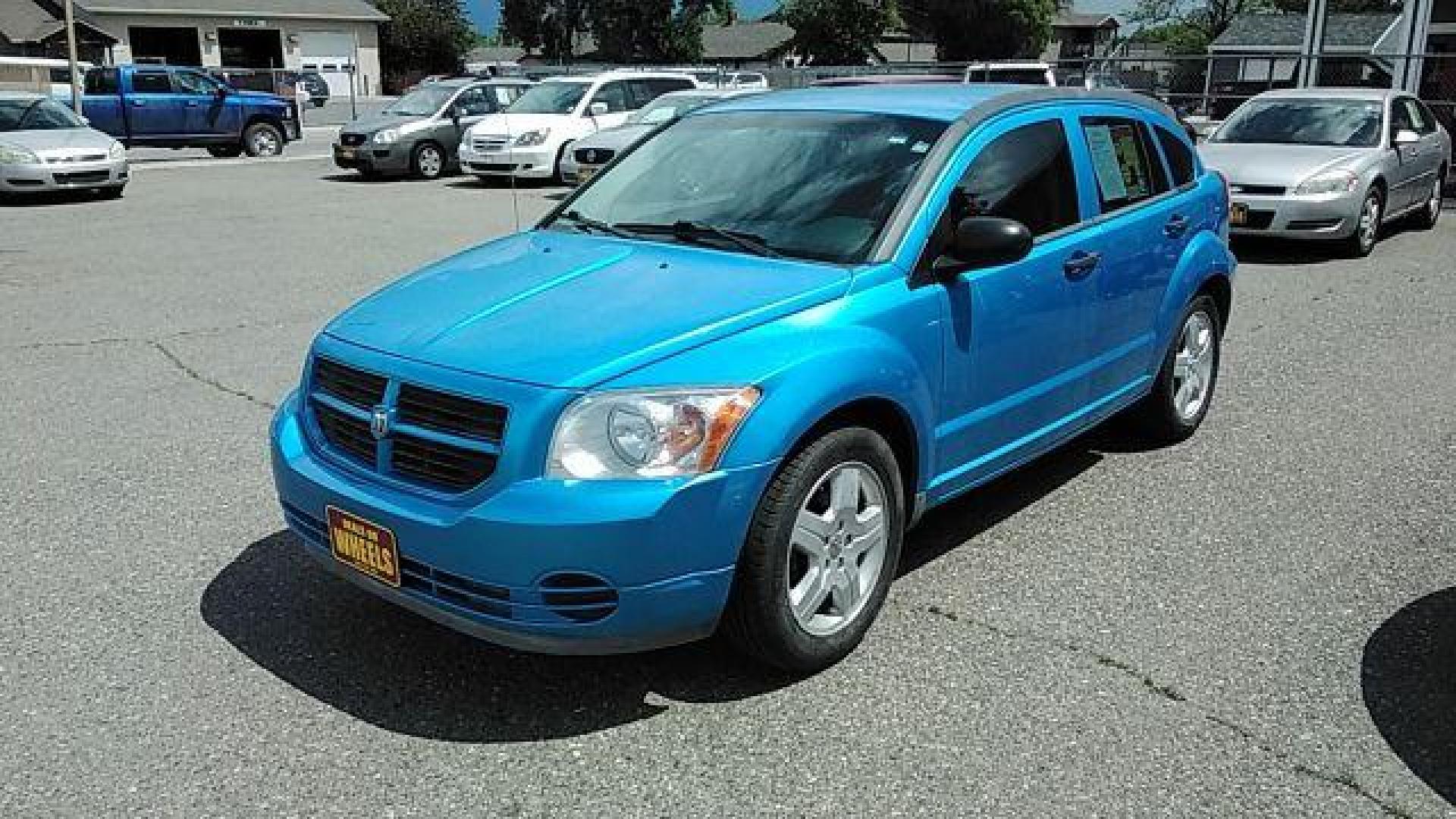 2008 Steel Blue Metallic /Dark Slate Gray Clot Dodge Caliber SE (1B3HB28C08D) with an 1.8L L4 DOHC 16V engine, located at 4047 Montana Ave., Billings, MT, 59101, 45.770847, -108.529800 - Photo#0