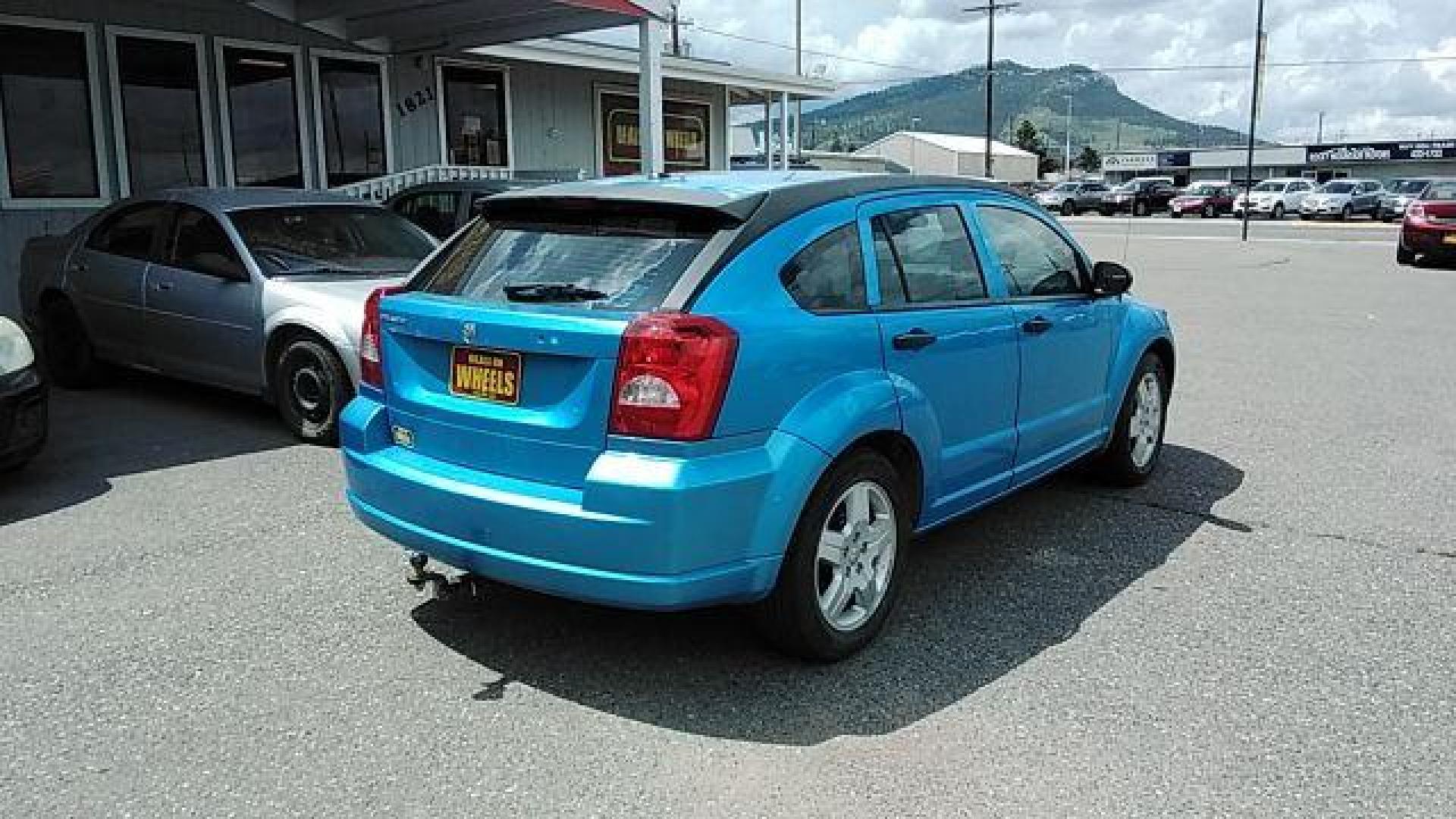 2008 Steel Blue Metallic /Dark Slate Gray Clot Dodge Caliber SE (1B3HB28C08D) with an 1.8L L4 DOHC 16V engine, located at 4047 Montana Ave., Billings, MT, 59101, 45.770847, -108.529800 - Photo#4