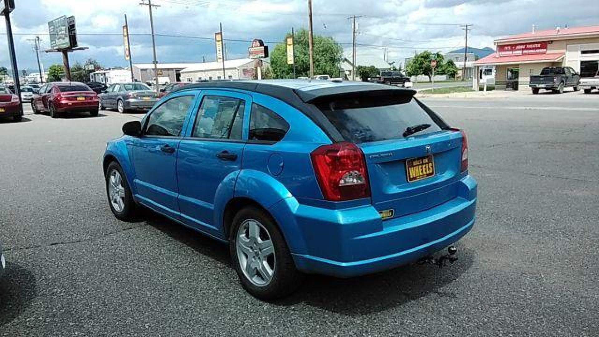 2008 Steel Blue Metallic /Dark Slate Gray Clot Dodge Caliber SE (1B3HB28C08D) with an 1.8L L4 DOHC 16V engine, located at 4047 Montana Ave., Billings, MT, 59101, 45.770847, -108.529800 - Photo#6