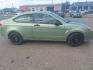 2008 GREEN FORD FOCUS green (1FAHP32N58W) with an 2.0L 16V engine, Manual transmission, located at 1821 N Montana Ave., Helena, MT, 59601, 0.000000, 0.000000 - Photo#3