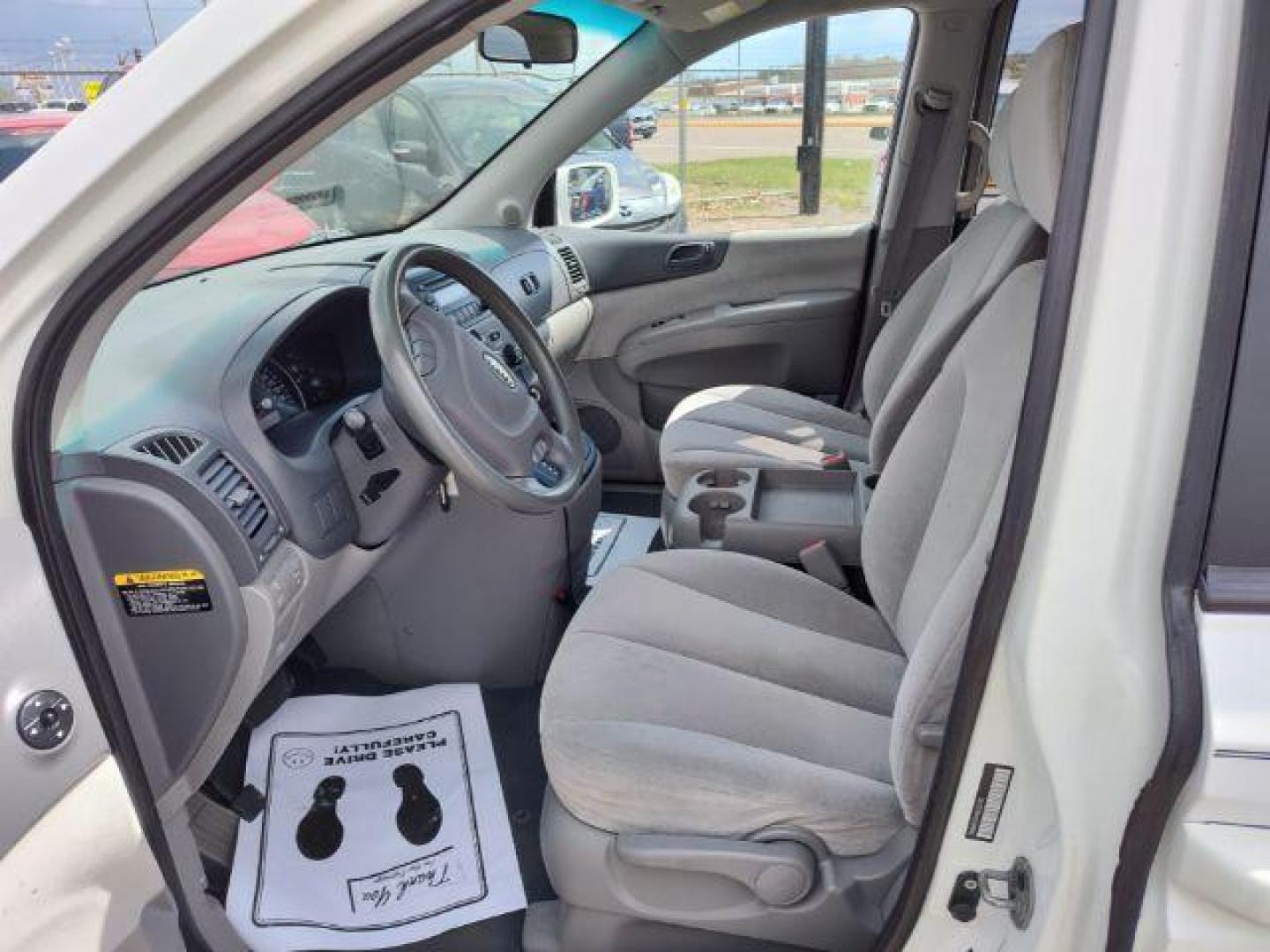 2008 Clear White Kia Sedona LX LWB (KNDMB233686) with an 3.8L V6 DOHC 24V engine, 5-Speed Automatic transmission, located at 4801 10th Ave S,, Great Falls, MT, 59405, (406) 564-1505, 0.000000, 0.000000 - Photo#8