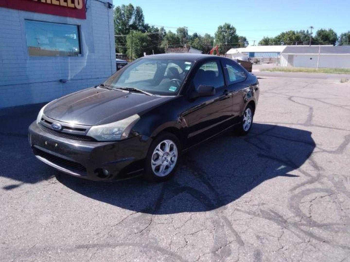 2009 Ford Focus SE Coupe (1FAHP32N69W) with an 2.0L L4 DOHC 16V engine, located at 4801 10th Ave S,, Great Falls, MT, 59405, (406) 564-1505, 0.000000, 0.000000 - Photo#0