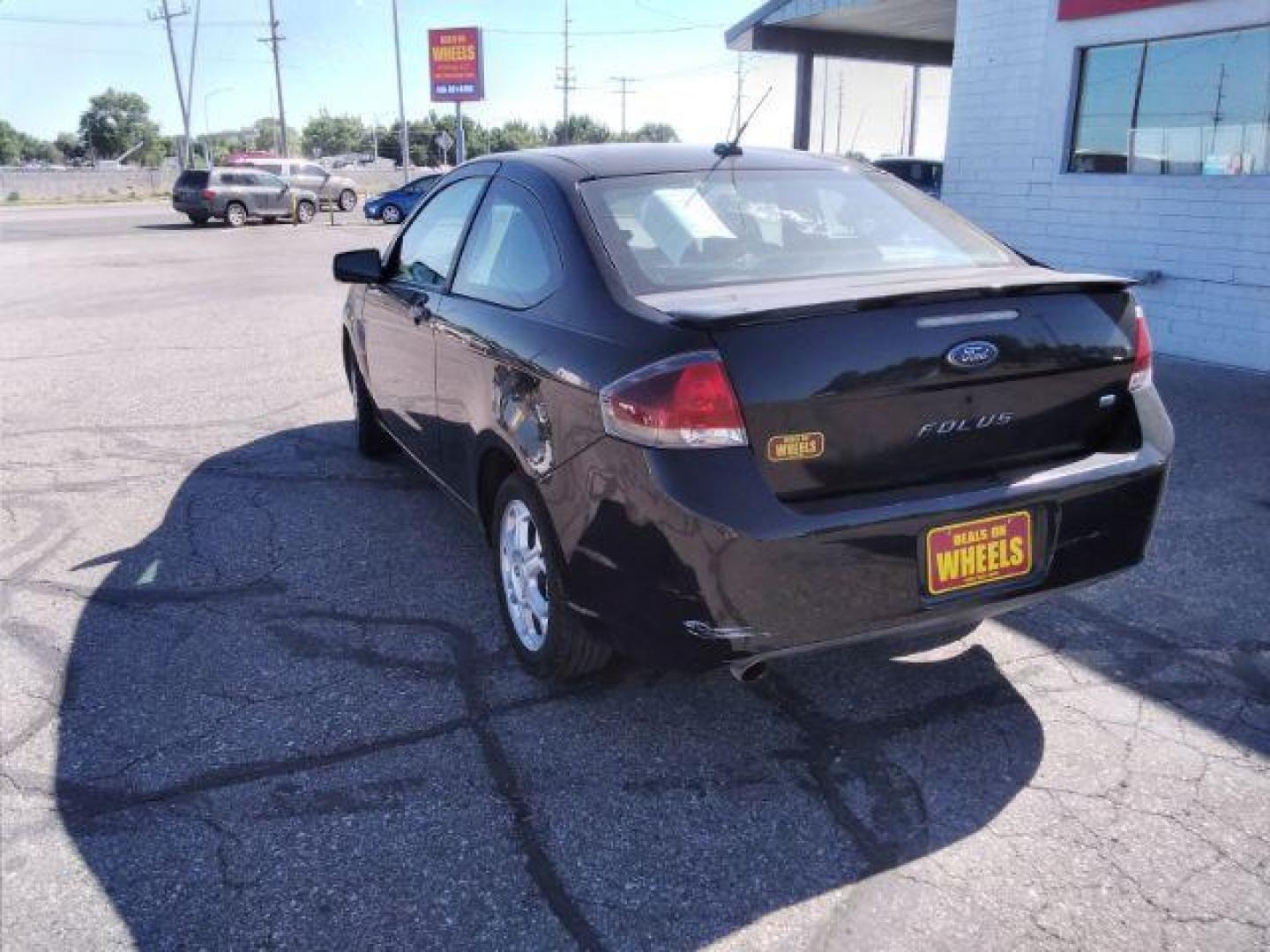 2009 Ford Focus SE Coupe (1FAHP32N69W) with an 2.0L L4 DOHC 16V engine, located at 4801 10th Ave S,, Great Falls, MT, 59405, (406) 564-1505, 0.000000, 0.000000 - Photo#2