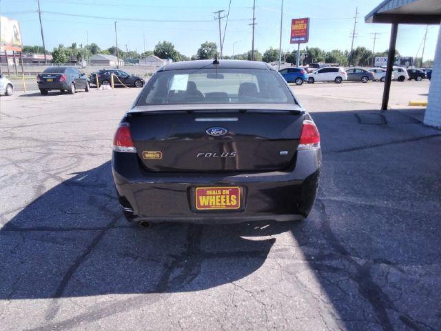 2009 Ford Focus SE Coupe (1FAHP32N69W) with an 2.0L L4 DOHC 16V engine, located at 4801 10th Ave S,, Great Falls, MT, 59405, (406) 564-1505, 0.000000, 0.000000 - Photo#3