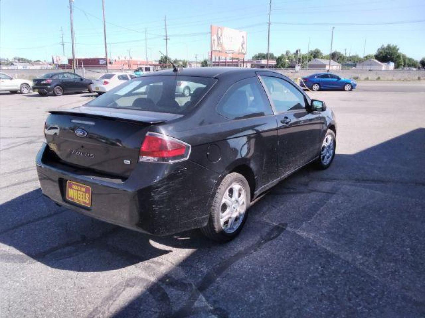 2009 Ford Focus SE Coupe (1FAHP32N69W) with an 2.0L L4 DOHC 16V engine, located at 4801 10th Ave S,, Great Falls, MT, 59405, (406) 564-1505, 0.000000, 0.000000 - Photo#4