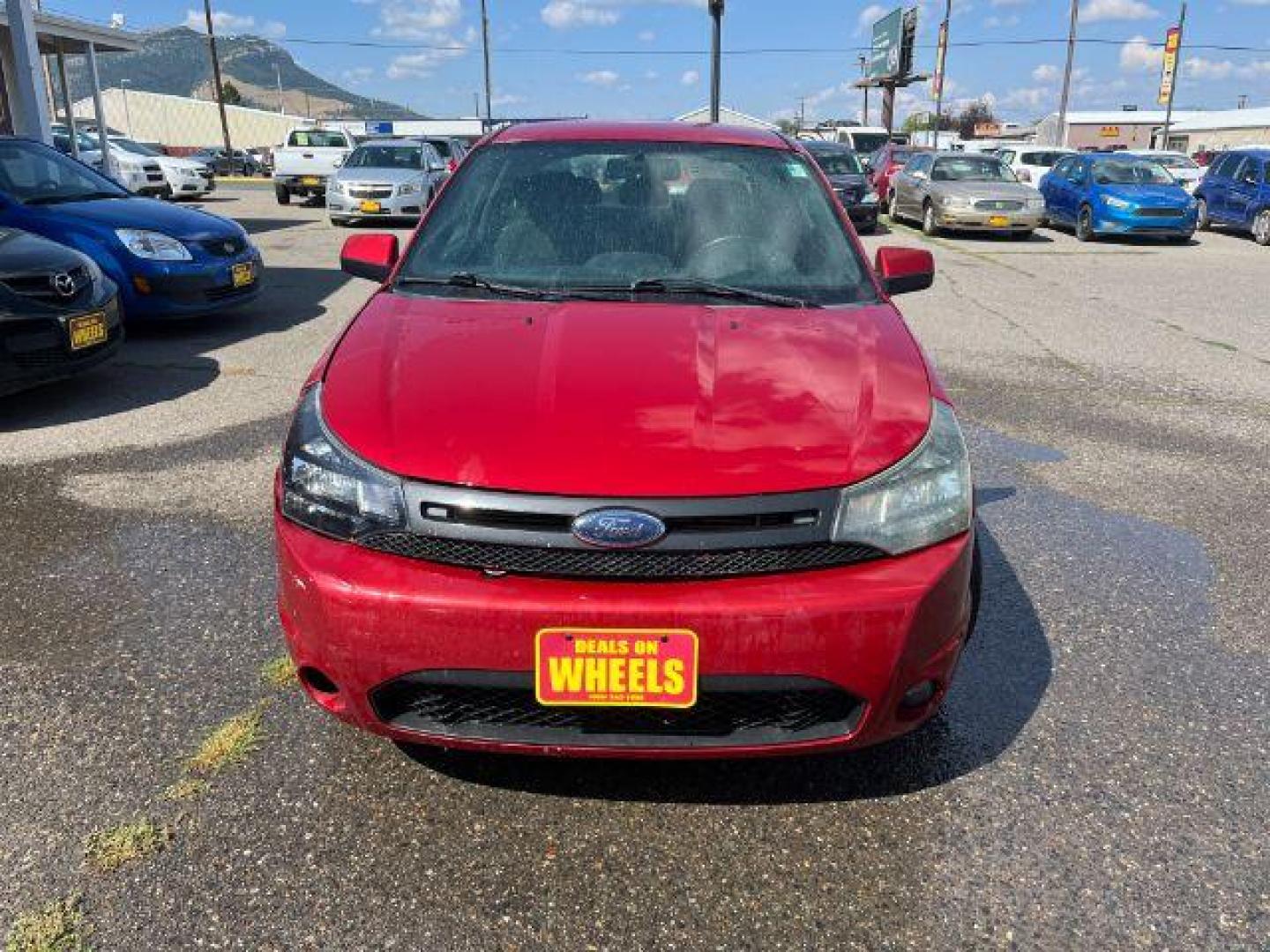 2009 Ford Focus SES Coupe (1FAHP33NX9W) with an 2.0L L4 DOHC 16V engine, located at 1821 N Montana Ave., Helena, MT, 59601, 0.000000, 0.000000 - Photo#1