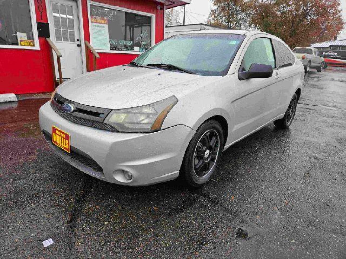 2009 Ford Focus SE Coupe (1FAHP32N39W) with an 2.0L L4 DOHC 16V engine, located at 601 E. Idaho St., Kalispell, MT, 59901, 0.000000, 0.000000 - Photo#0