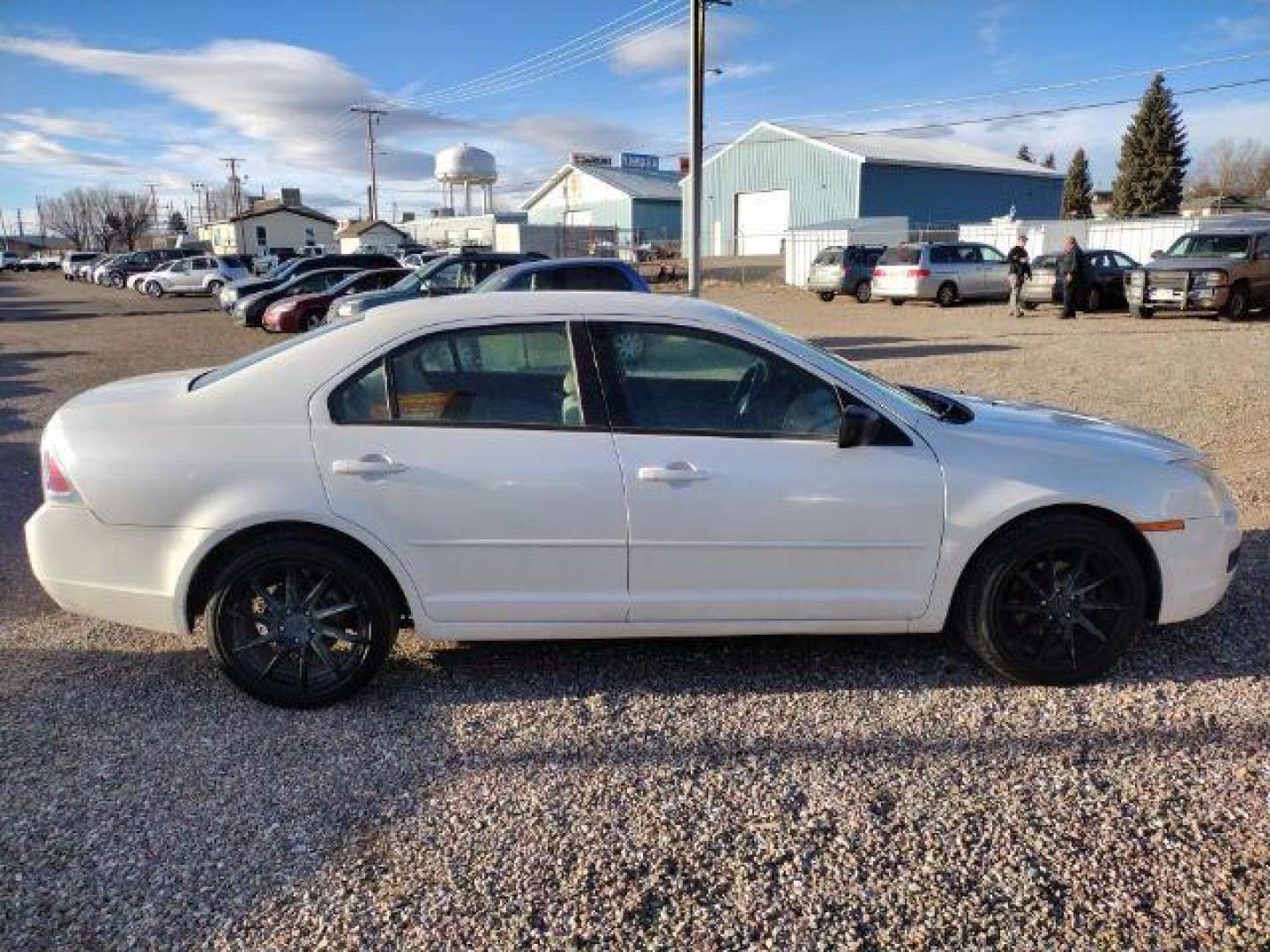 2009 Ford Fusion I4 S (3FAHP06Z19R) with an 2.3L L4 DOHC 16V engine, located at 4801 10th Ave S,, Great Falls, MT, 59405, (406) 564-1505, 0.000000, 0.000000 - Photo#5