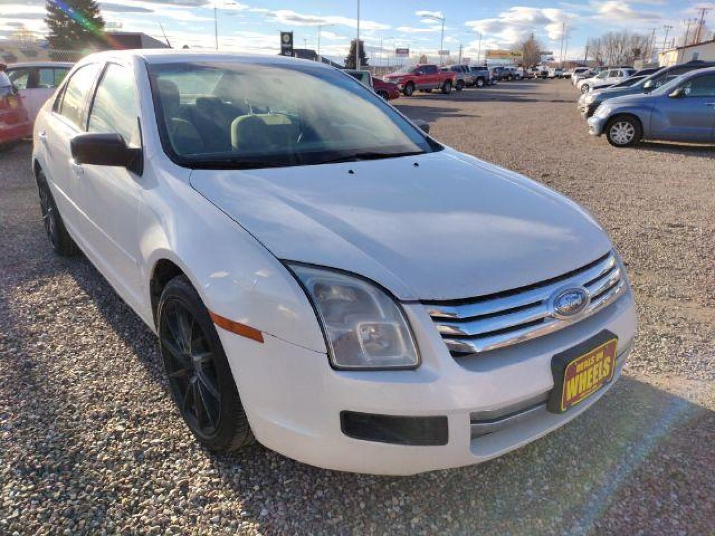 2009 Ford Fusion I4 S (3FAHP06Z19R) with an 2.3L L4 DOHC 16V engine, located at 4801 10th Ave S,, Great Falls, MT, 59405, (406) 564-1505, 0.000000, 0.000000 - Photo#6