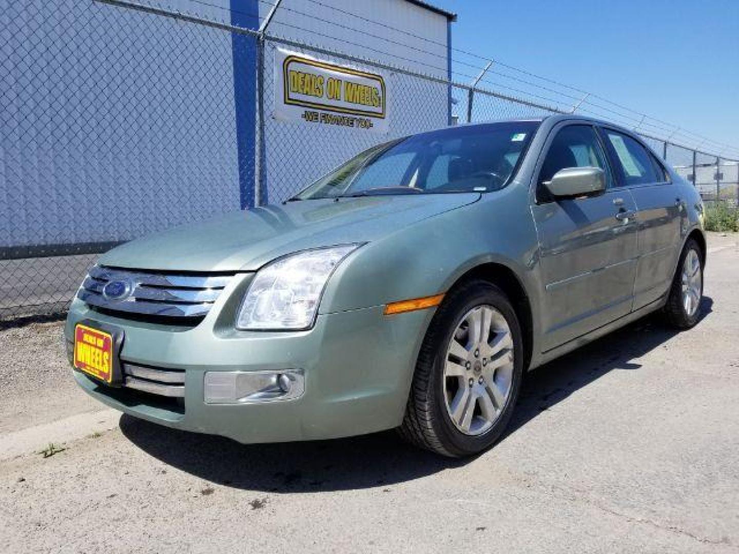 2009 Ford Fusion V6 SEL AWD (3FAHP02119R) with an 3.0L V6 DOHC 24V engine, located at 601 E. Idaho St., Kalispell, MT, 59901, 0.000000, 0.000000 - Photo#0