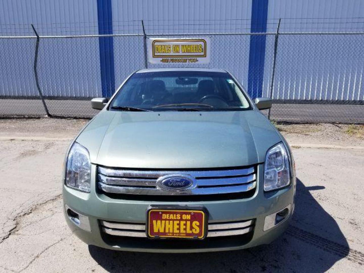 2009 Ford Fusion V6 SEL AWD (3FAHP02119R) with an 3.0L V6 DOHC 24V engine, located at 601 E. Idaho St., Kalispell, MT, 59901, 0.000000, 0.000000 - Photo#1