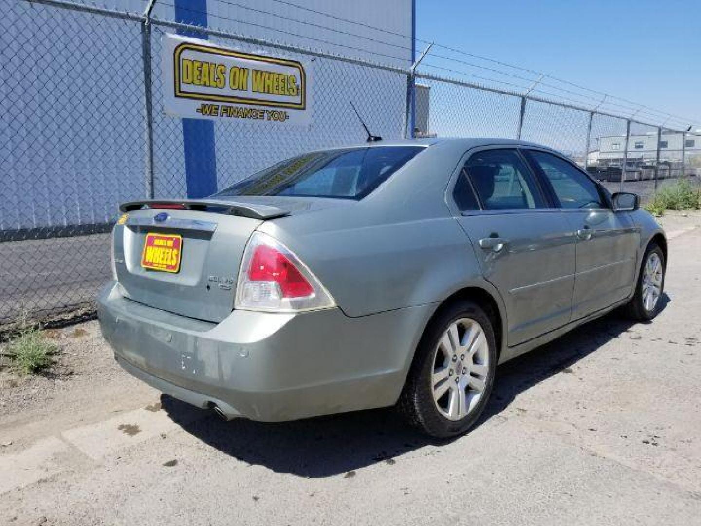 2009 Ford Fusion V6 SEL AWD (3FAHP02119R) with an 3.0L V6 DOHC 24V engine, located at 601 E. Idaho St., Kalispell, MT, 59901, 0.000000, 0.000000 - Photo#4