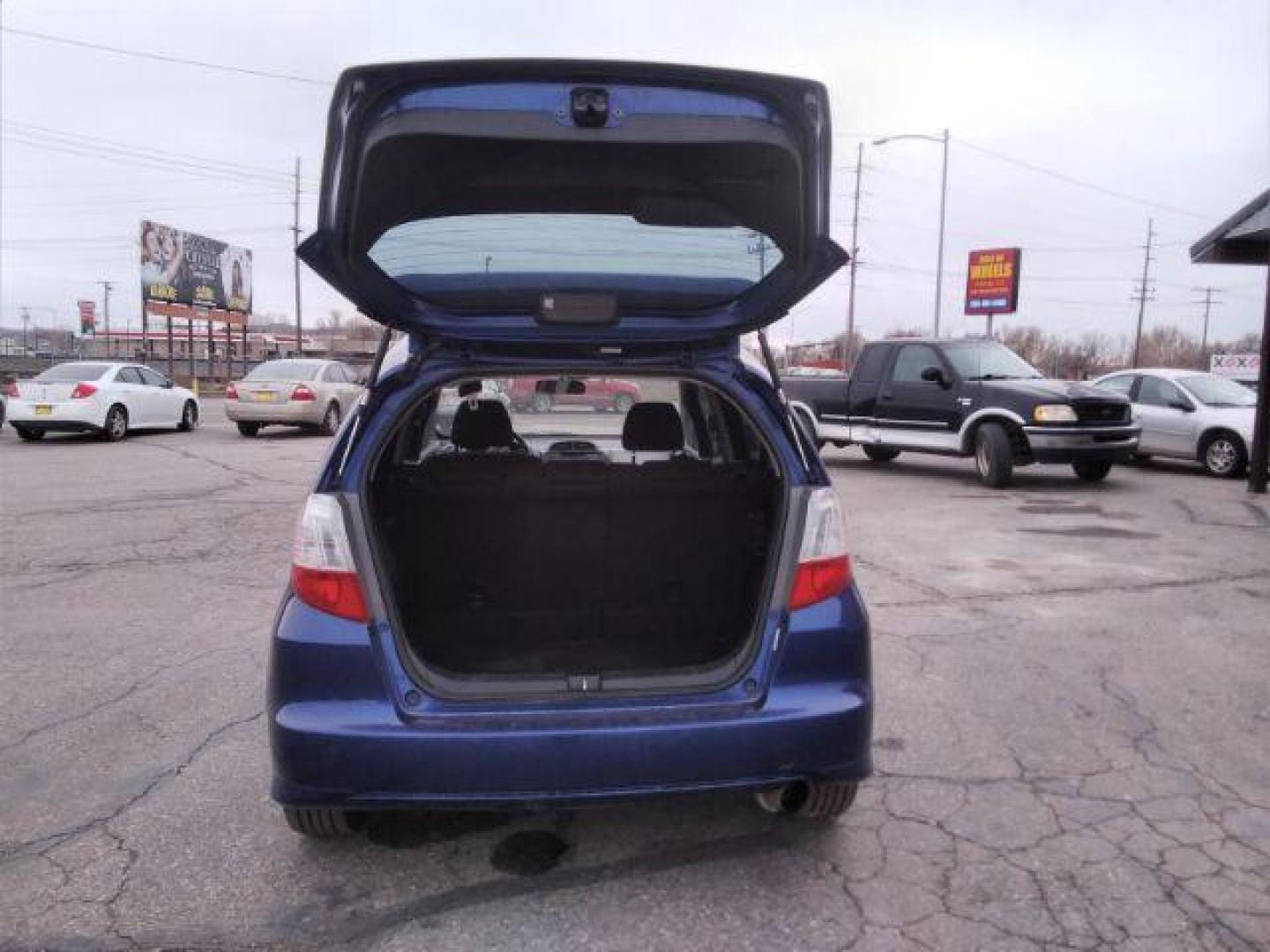 2009 Honda Fit Sport 5-Speed MT (JHMGE87409S) with an 1.5L L4 SOHC 16V engine, 5-Speed Manual transmission, located at 4047 Montana Ave., Billings, MT, 59101, 45.770847, -108.529800 - Photo#11