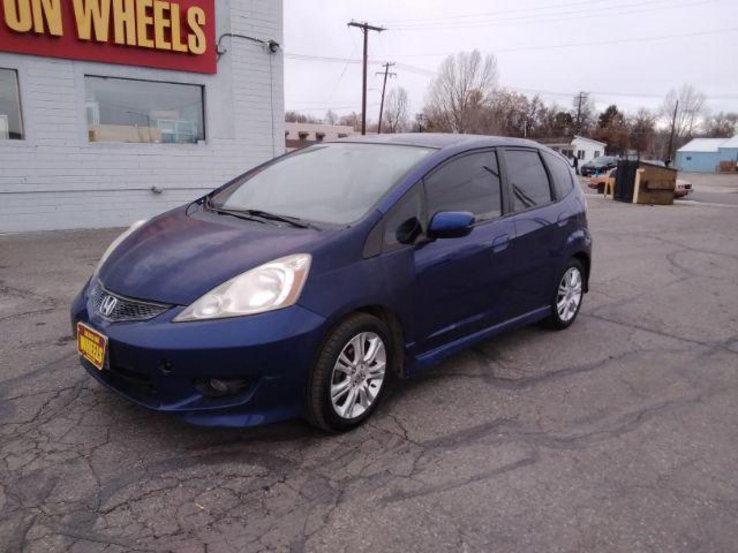 2009 Honda Fit Sport 5-Speed MT (JHMGE87409S) with an 1.5L L4 SOHC 16V engine, 5-Speed Manual transmission, located at 4047 Montana Ave., Billings, MT, 59101, 45.770847, -108.529800 - Photo#4